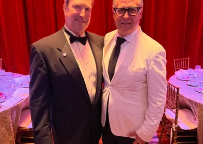 Terry Tallen stands alongside CEO and IU Foundation president JT Forbes with his Laurel Pin award